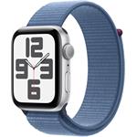 Apple Watch SE (2023), 44 mm, Strieborný hliník, ľadovo modrý prevliekací športový remienok
